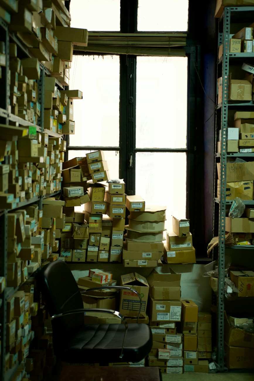 Stacks of boxed consumer goods prepared for freight transport and supply chain inventory management.