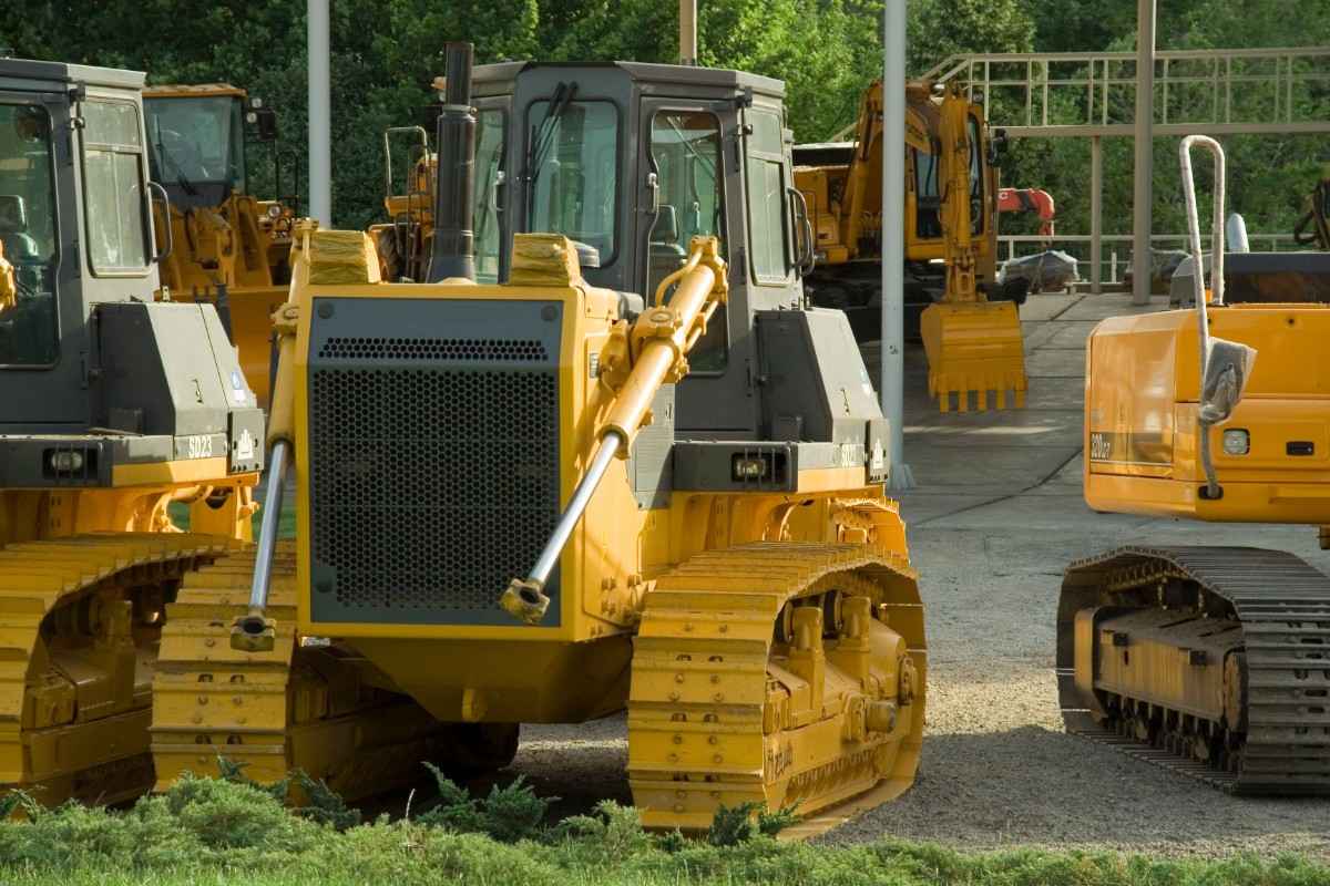 Heavy industrial bulldozer on a job site representing oversized machinery transport and specialized construction equipment logistics.